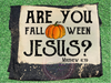 Dark Heather Bleached tee with quote Are You Fall-o-Ween Jesus? Matthew 4:19 and an image of a pumpkin.