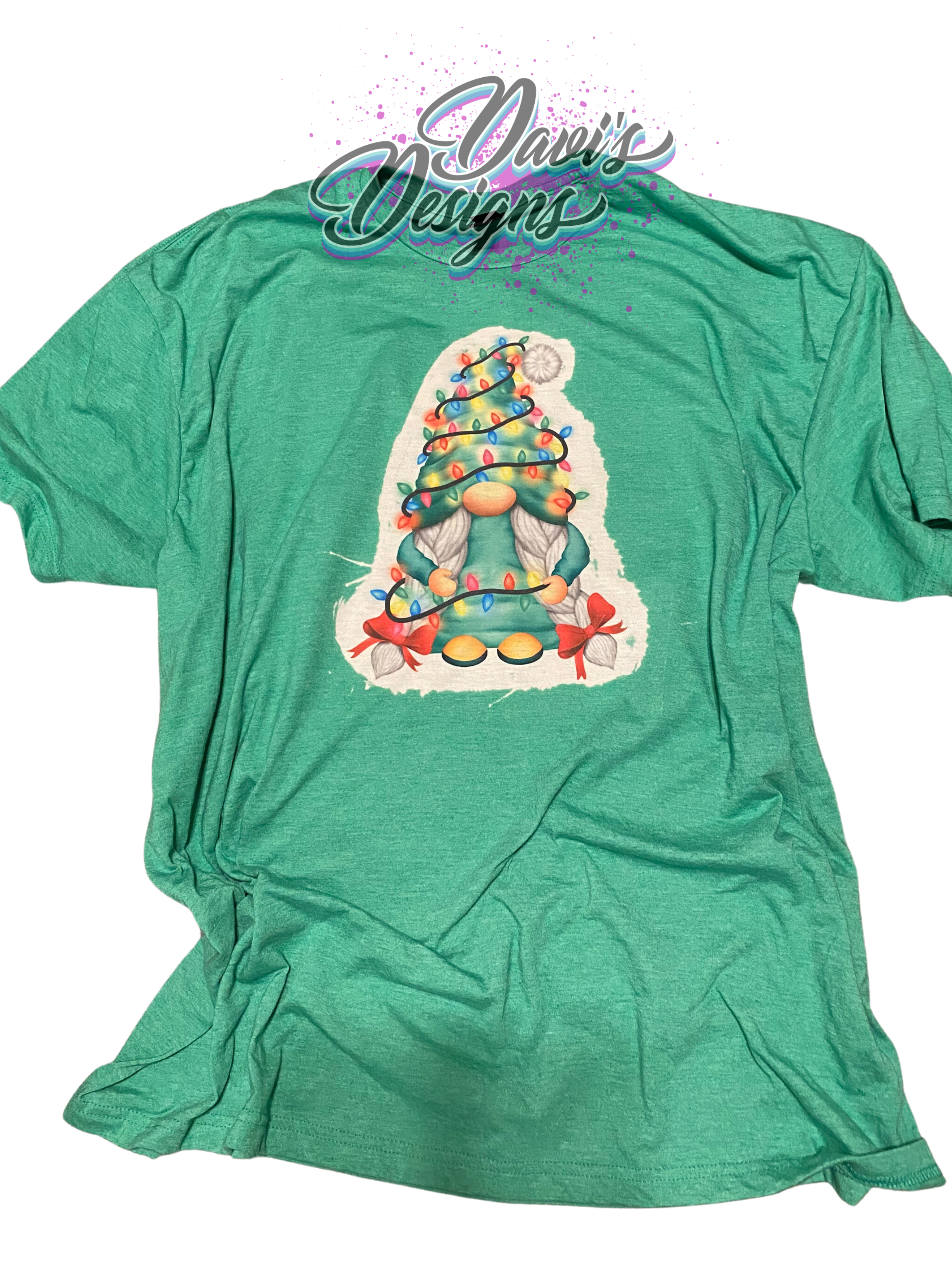 Heather Irish Green tee with Green Christmas tree hat Gnome wrapped in Christmas lights.