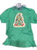 Heather Irish Green tee with Green Christmas tree hat Gnome wrapped in Christmas lights.