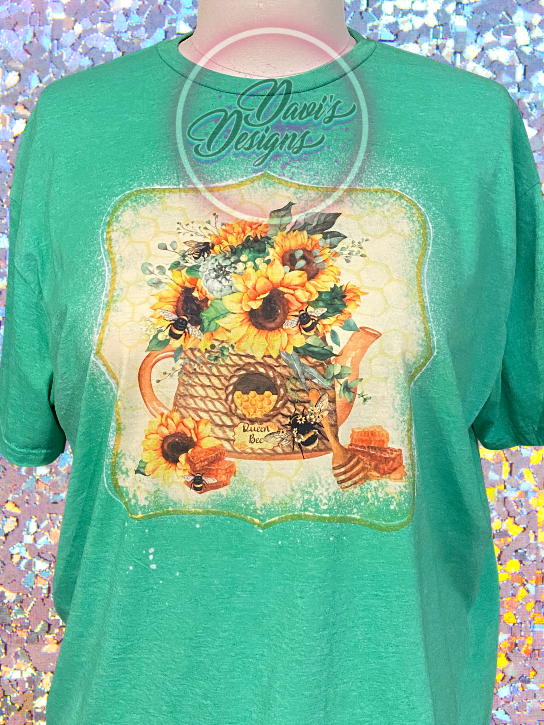 Heather Irish Green bleach patterned tee with a honey pot with bees and sunflowers.